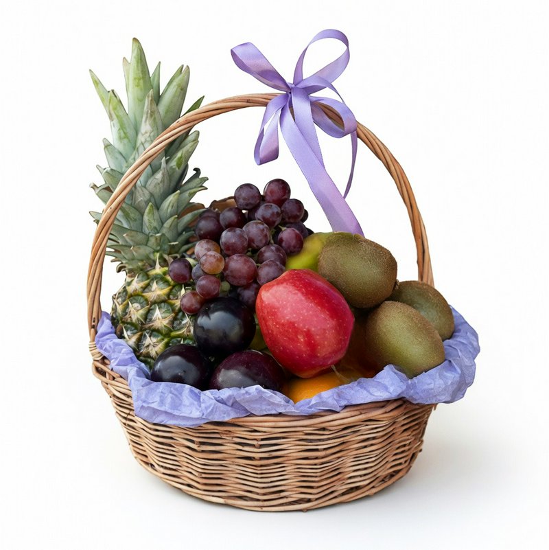 Fruit basket with pineapple, kiwi, and grapes